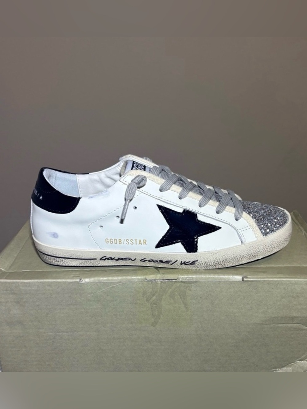 Golden Goose White Leather Sneaker with Black Star and Silver Glitter Toe Cap